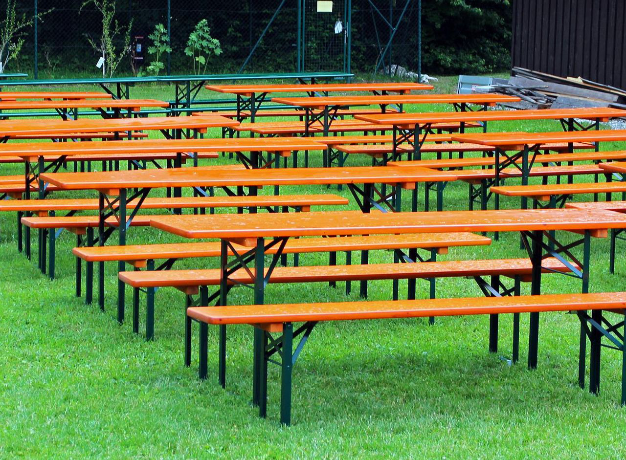 Marquee table sets without tablecloths are bare and uncomfortable